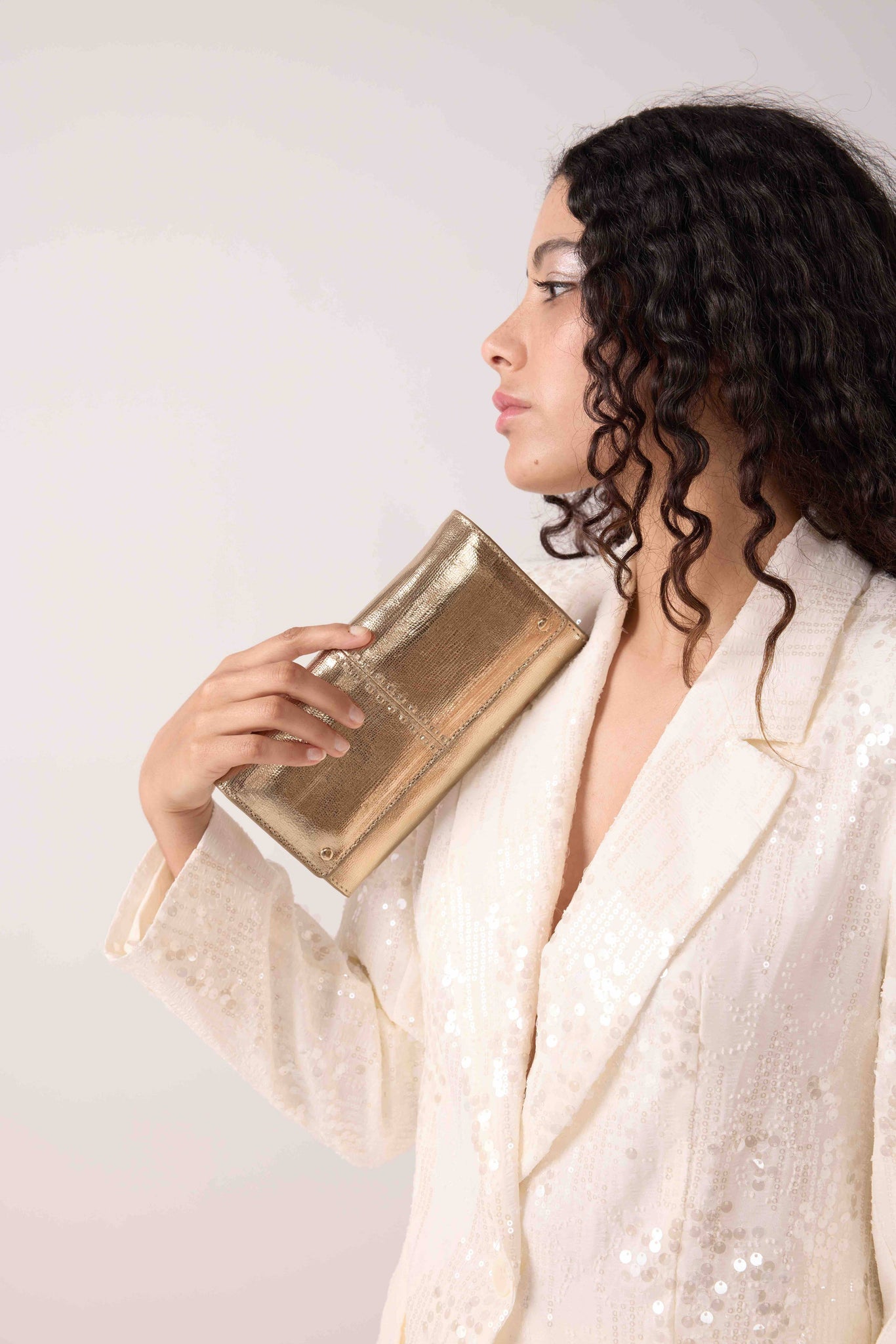 Gina gold clutch and crossbody bag