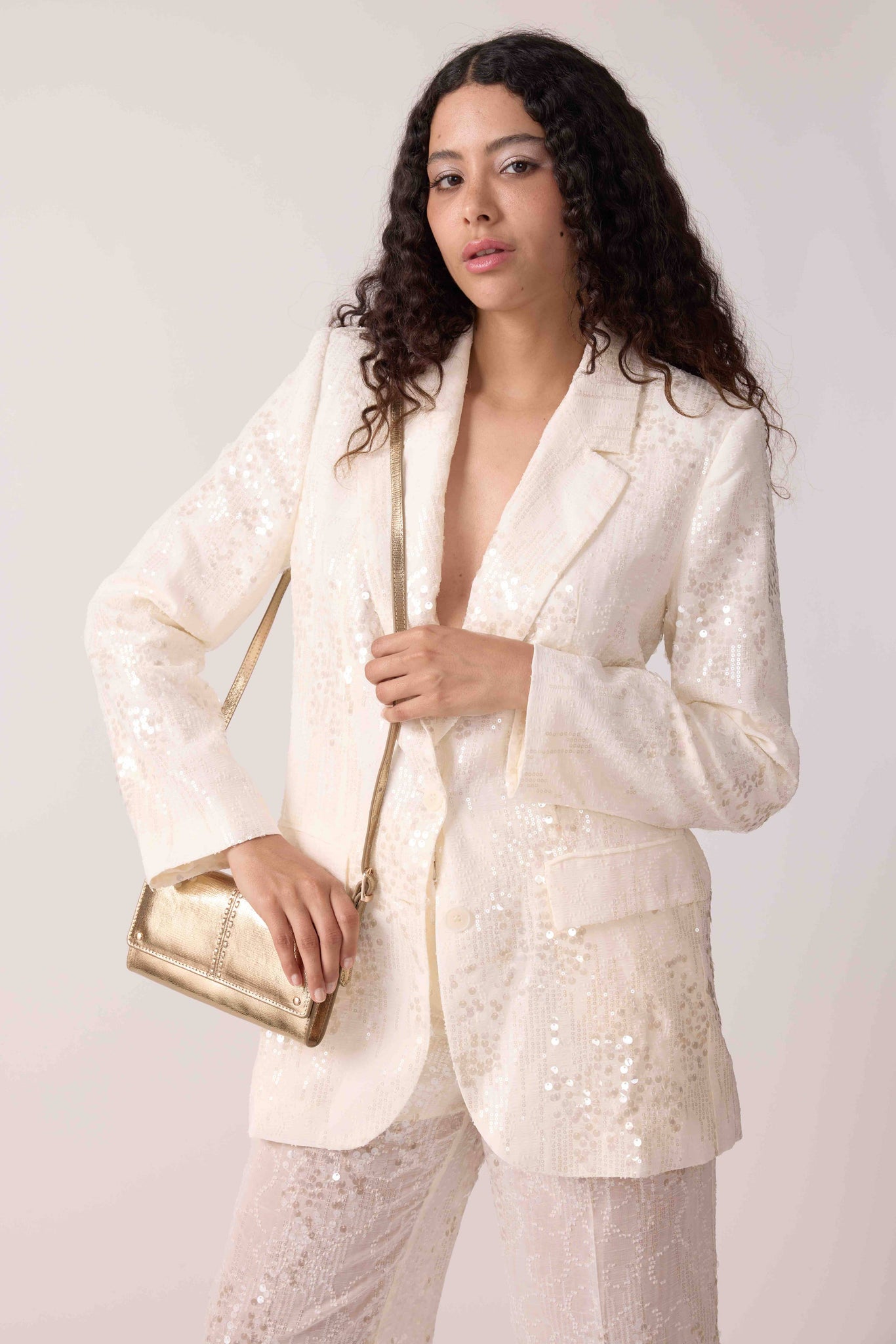 Gina gold clutch and crossbody bag