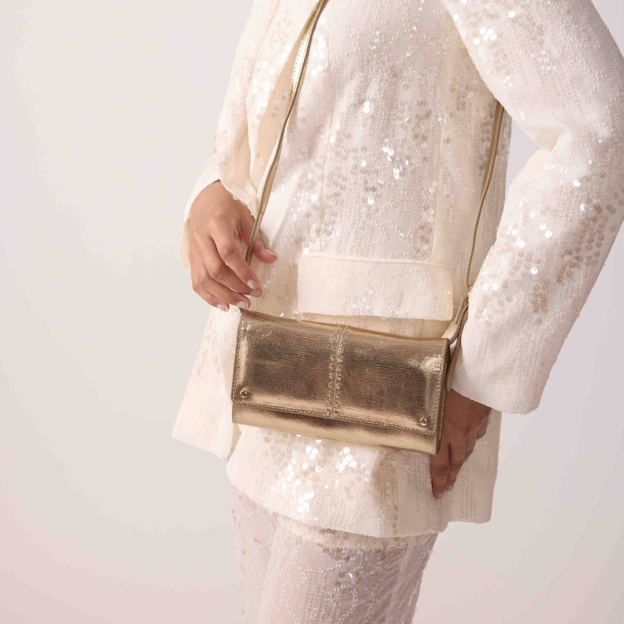 Gold clutch bag